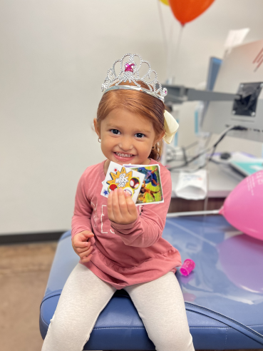 Caring for Dental Crowns Happy Springfield Patient with Prizes